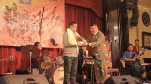 BCC Chairperson Rajen Giri honouring singer Pratap Subba. Photo: Rajen Giri