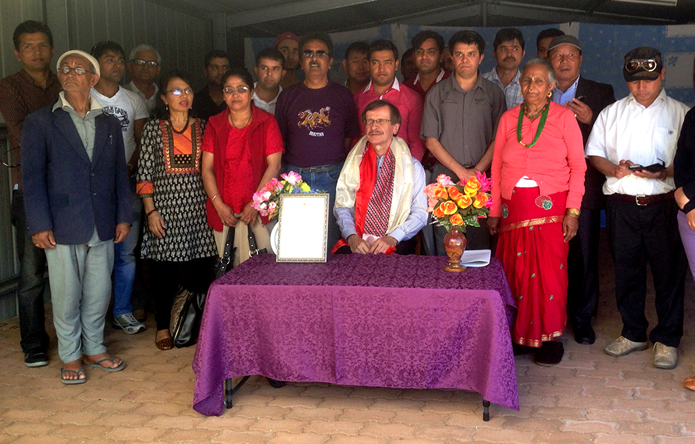Bhutanese community members with Dr Manfred after the honour function